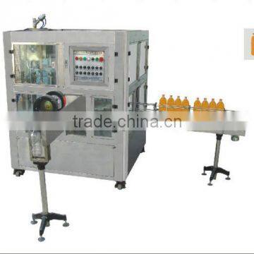Granular drink filling and capping machine .