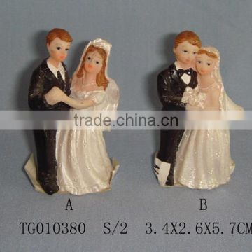 resin bride and bridegroom figurines