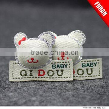Double-sided woven zipper puller