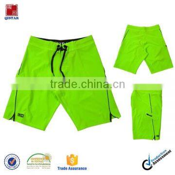 2018 fluorescent green solid color spendex boardshorts