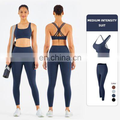 Two Piece Yoga Set Custom Sports Gym Set Women Seamless Buckle Sports Bra And Pocket Leggings