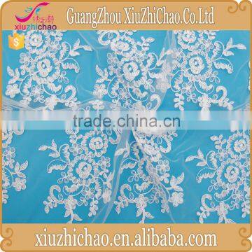 Wholesale top quality african ivory pearl embroidery lace fabric for wedding gown