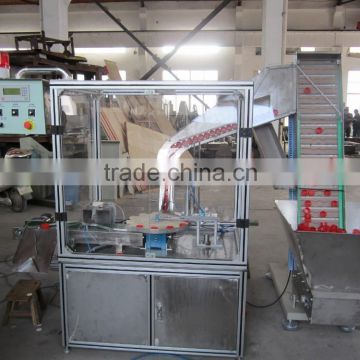 Automatic cap plastic dropping machine