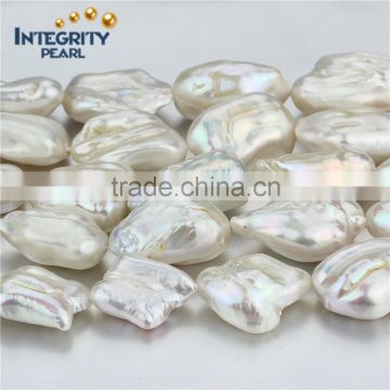 White irregular freshwater pearl strand around 16 mm biwa pearl strand