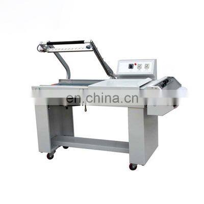 BSL-7560L Hualian Automatic Packaging Wrap PVC Polyolefin Film Packing Heat Tube Cutting Shrink Wrapping Machine