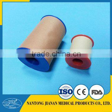 skin or white color zinc oxide adhesive tape with plastic cover