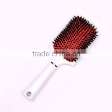 Plastic cushion hair brush with boar bristle pin