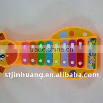 toy of giraffe with plastic xylophone