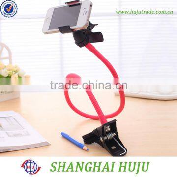 Desktop flexible cell phone holder