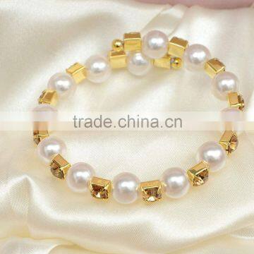 single row pearl and rhinestone graduated wraparound coil bracelet