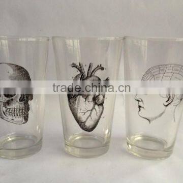 16 oz crystal pint glass with customized comics logo