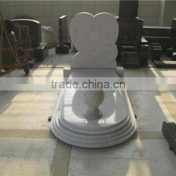 European style granite heart shape headstones with kerbs