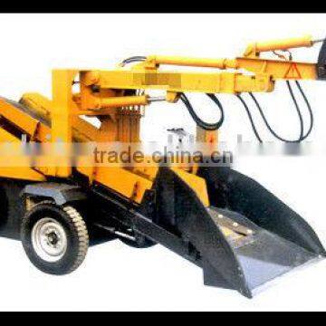 WTO-60 digging arm loader