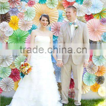 Colorful paper fan with fancy patterns