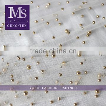 New arrival Transparent tulle soft beige net fabric with gold beads for Girl's dress