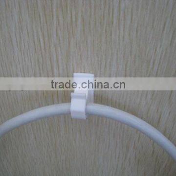 Plastic adhesive wire wall clips