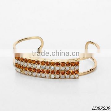 Curved crystals mosaic gold bar cuff bangle