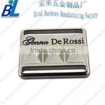 Die cast metal side release buckles for bags