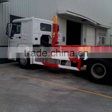 Sinotruk HOWO 8x4 Hook lift garbage truck for sale