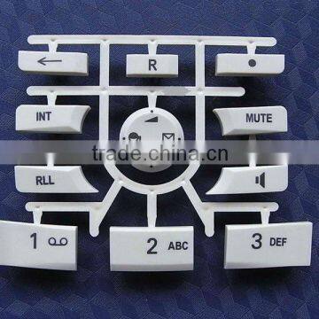 Plastic injection mould for electronic push button