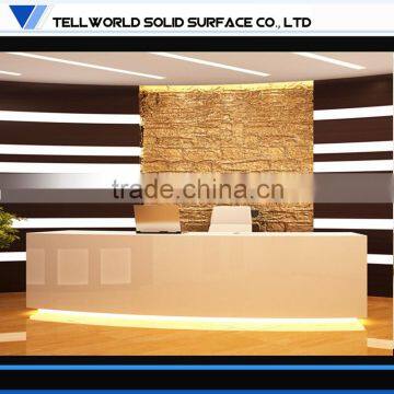 White lighted high glossy elegant beauty salon hotel reception counter