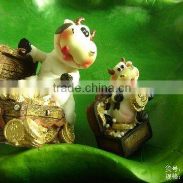 Polyresin cow with money case