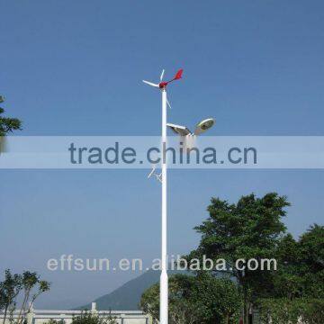 Alternative energy low rotation wind turbine integrated solar street light