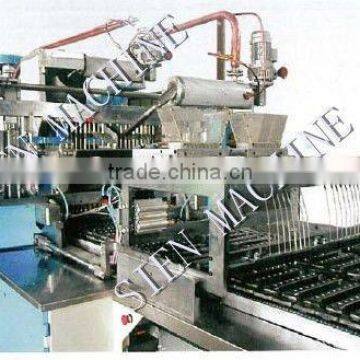 Automatic lollipop depositing line ( PLC controlled)---with stick automatic inserting system