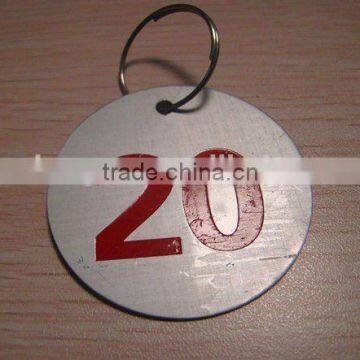 Round anodized aluminum luggage tags