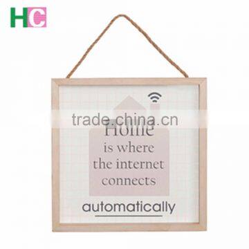 high quality wooden photo frame mounted on the wall with rope