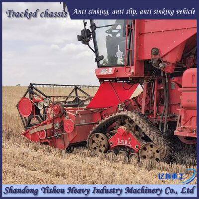 Wheat Harvester Modified With Triangular Track Wheels for Muddy Terrain Operation to Prevent Slipping photo-2
