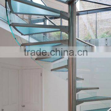 Modern Spiral Staircase With Glass Treads and Glass Railings photo-3