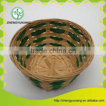 Green bamboo chip woven round storage basket