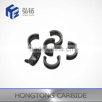 Tungsten carbide halfmoon buncher guide