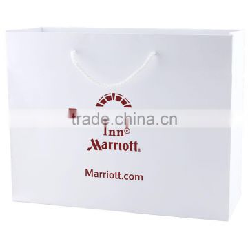 White Kraft Eurotote Shopping Bag - features cardboard bottom, dimensions are 13" x 5" x 10" and comes with your logo.