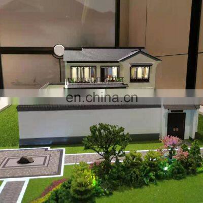 The scale model of multi-layer lifting style house with light