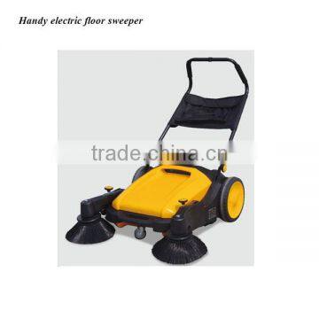 Hand propelled brush floor sweeper