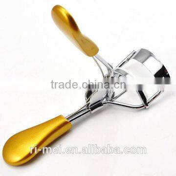 gold bling eyelash curler