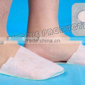 Nonwoven slipper