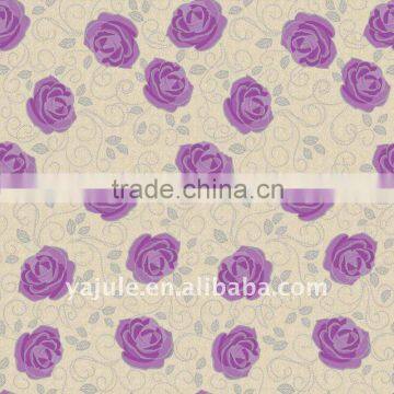 Laminated PVC table cloth with non-woven as backing.