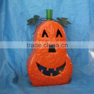 Iron pumpkin candle holder