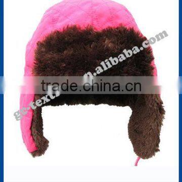 red winter hat with brown fake fur