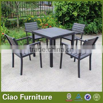 Used Teak wood dining table and chair with aluminum frame