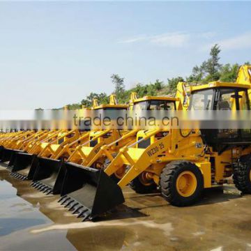 Backhoe loader with attachments CE