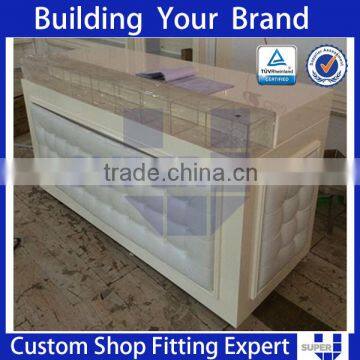 clothing store display design tailor made white modern reception desk