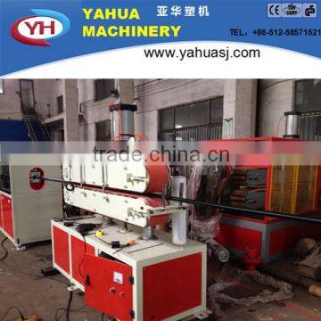 Plastic pipe hauling machine