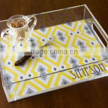 clear acrylic serving tray with hands