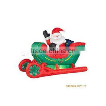 Enjoying inflatable santa claus in rocking chair