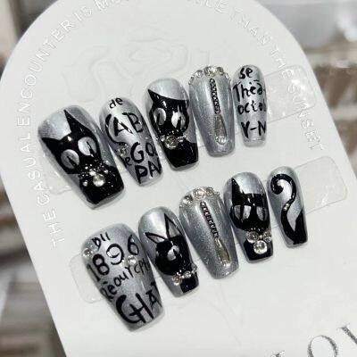 New Year/Christmas themed nail art designs quirky zombie/Hello Kitty themed designs 3D butterfly nail art pearl and rose-themed nail art