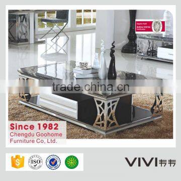 modern design carved mental coffee table base with marble top